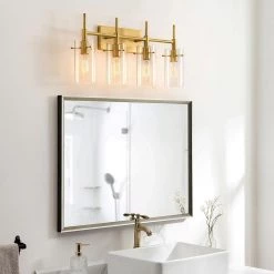27.5 in. 4-Light Antique Brass Cylindrical Vanity Light with Clear Glass Shade by Kawoti 20 27.5 in. 4-Light Antique Brass Cylindrical Vanity Light with Clear Glass Shade by Kawoti -Safavieh Sales antique brass kawoti vanity lighting 21125 d4 1000